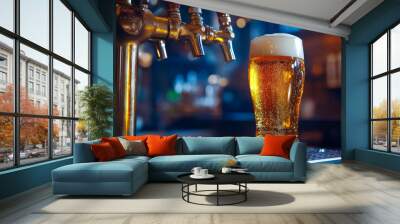 A beer tap pouring a fresh pint.  Wall mural