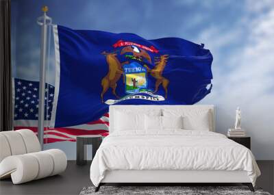 the michigan state flag waving along with the national flag of the united states of america Wall mural