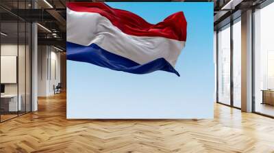 The national flag of the Netherlands waving in the wind on a sunny day Wall mural