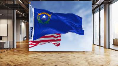 The Nevada state flag waving along with the national flag of the United States of America Wall mural