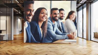 Group of happy young business people in a meeting at office Wall mural