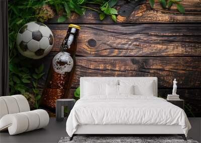 Fresh cold beer and soccer ball on dark wooden table. Watch match with friends in pub or bar. Game and drink. World championship cup. Sport and leisure. Banner with copy space. Top view, flat lay Wall mural