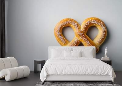 Heart shaped pretzel isolated on white background. Traditional bakery concept. Oktoberfest festival and Pretzel Day celebration. Flat lay, top view. Banner with copy space Wall mural