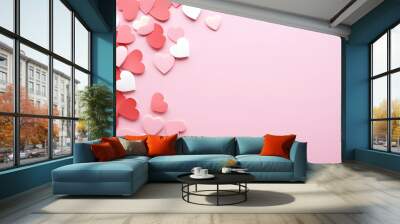 Many pink heart shaped confetti scratched on light rose background. Festive abstract backdrop. Romantic and love concept. Valentines day background for design greeting card, banner with copy space Wall mural