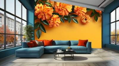 Orange and red marigold flowers on pastel yellow background. Chinese mid autumn festival. Toran Indian traditional decoration. Symbol of mexican holiday Day of dead. Happy Diwali Wall mural