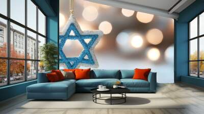 Star of David pendant with festive bokeh background. Hanukkah celebration concept. Jewish holiday and religious symbol. Judaism traditions. Banner, greeting card with copy space Wall mural