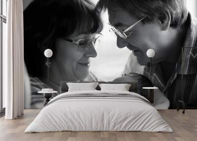 Loving Parents Gazing at Their Newborn Baby in Hospital Bassinet Wall mural