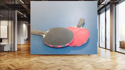 Ping pong rackets and balls on table Wall mural