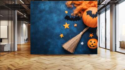 A festive Halloween scene featuring pumpkins, broom, and decorative elements, evoking playful and spooky atmosphere. Wall mural