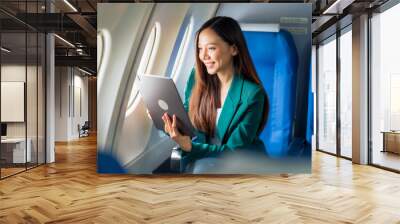 Female airplane passengers asian chinese people Entrepreneurs on Flight, Venturing Overseas Investments. Global Business Expansion, Foreign Markets, Strategic Financial Moves. Women in Business Suits Wall mural