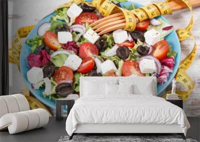 Centimeter and greek salad with feta cheese and vegetables. Healthy lifestyles, food and slimming Wall mural