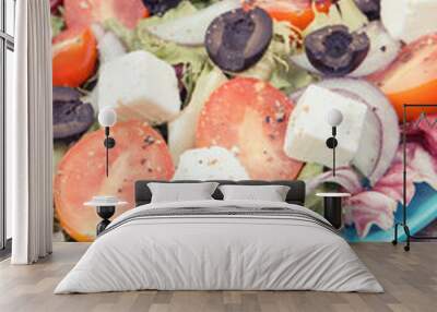 Tape measure with fresh greek salad with feta cheese and vegetables. Best food for dieting and slimming Wall mural