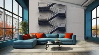 fire escape stair steel. grey outdoor metal stair of the high building. Wall mural