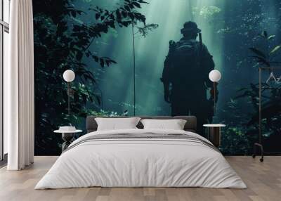 A man in a military uniform stands in a forest with trees and bushes. The image has a dark and mysterious mood, with the man's silhouette against the trees and the shadows cast by the sunlight Wall mural