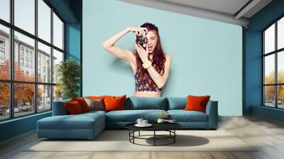 fashion stylish woman dancing and making photo using retro Wall mural