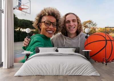 selfie of two friends smiling after play basket Wall mural