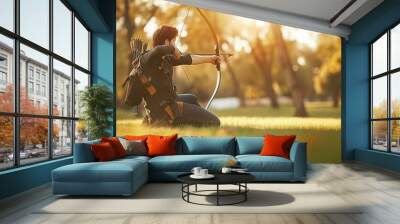 Young archer taking aim in a sunlit park, showcasing skill and focus in an outdoor setting. Wall mural