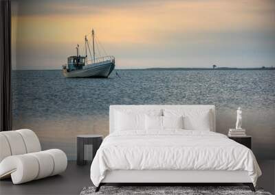 fishing boat on the sea at sunset, sunset by the sea with boat Wall mural