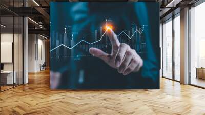 Businessman holding growth business graph progress ,startup business finance technology and investment trading trader investor.Stock Market Investments Funds and Digital Assets, graph financial data. Wall mural