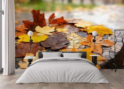 Colorful autumn leaves scattered on a mosaic surface, capturing the essence of fall with vibrant earthy tones. Wall mural