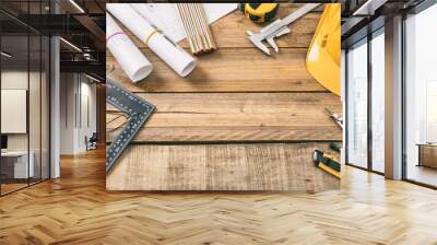 Architect workplace. Project construction blueprints and engineering tools on wooden desk, copy space Wall mural