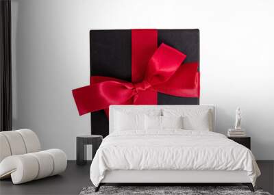 Black Friday Sale. Black gift box with red ribbon bow isolated on white transparent, top view Wall mural