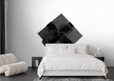 Black Friday Sale. Black gift box with ribbon bow isolated on white transparent, top view Wall mural