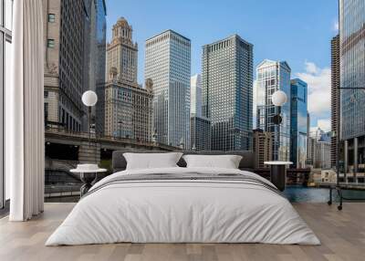 Chicago city skyscrapers on the river canal, blue sky background Wall mural