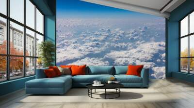 Cloudscape background. View out of an airplane window. Wall mural