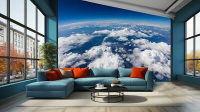 Curvature of planet earth. Aerial shot. Blue sky and clouds Wall mural