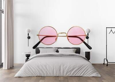 Golden frame sunglasses with pink lens isolated on white background, top view Wall mural