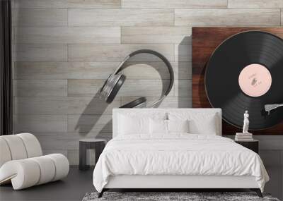 Headphones and vinyl LP record player on wooden background, banner, copy space. 3d illustration Wall mural