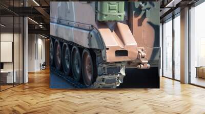 military tank, asphalt street. war weapon, armored vehicle camouflage color, close up view Wall mural