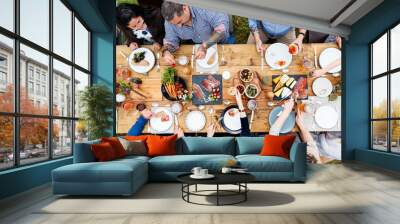 Aerial view of people having dinner in the backyard Wall mural