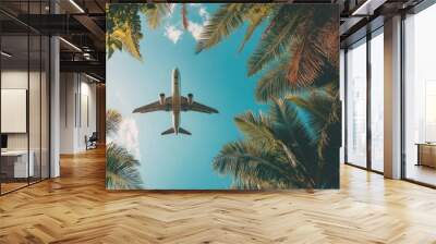 Airplane on tropical background nature summer trees. Wall mural