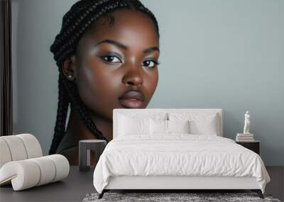 Black young woman with knotless braids hair portrait skin photography. Wall mural