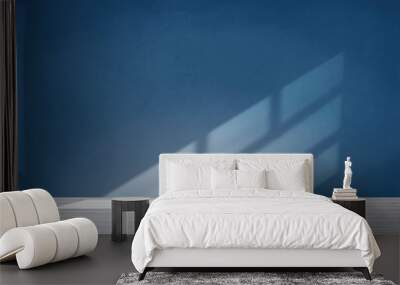 Blue wall in an empty room with concrete floor Wall mural