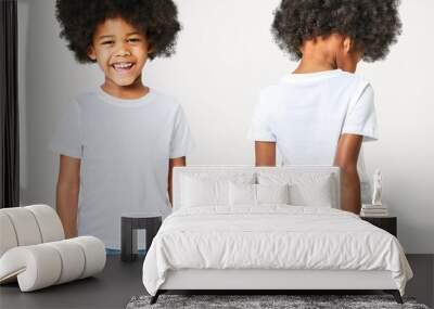 Boy's white t-shirt and jeans in studio Wall mural