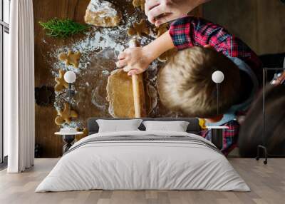 Boy making gingerbread cookies Wall mural