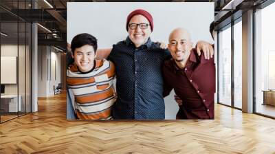 Cheerful diverse people embracing each other Wall mural