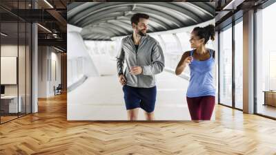 Couple working out together Wall mural