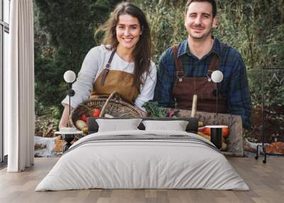 Couple working together at a farm Wall mural