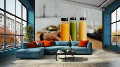 Detox cold-pressed juice in bottles Wall mural