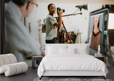 Director communicating with the photographer Wall mural