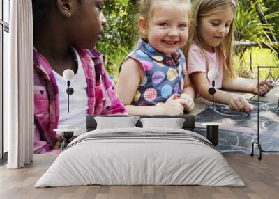 Diverse group of kids drawing Wall mural