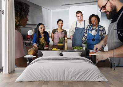 Diverse people joining cooking class Wall mural