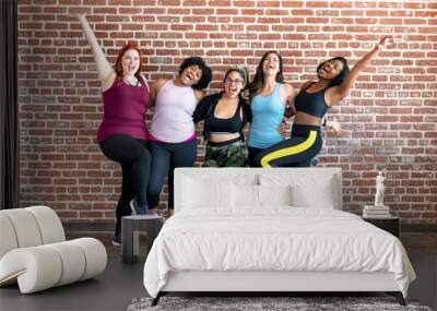 Diverse womens fitness class Wall mural