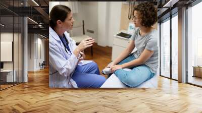 doctor is checking a patient Wall mural