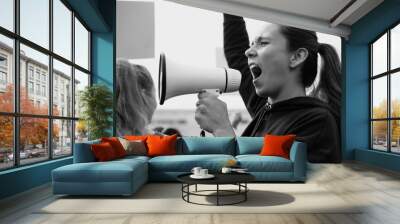 Female activist shouting on a megaphone Wall mural