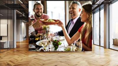 Friends at a dinner party Wall mural